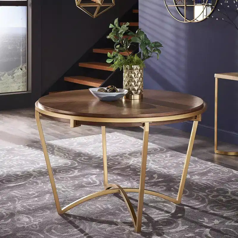 Mesa de comedor redonda marrón y dorada, base de 4 patas, con capacidad para 4 personas